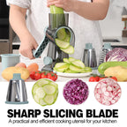 Person using a vegetable slicer with sliced vegetables displayed on a kitchen counter.